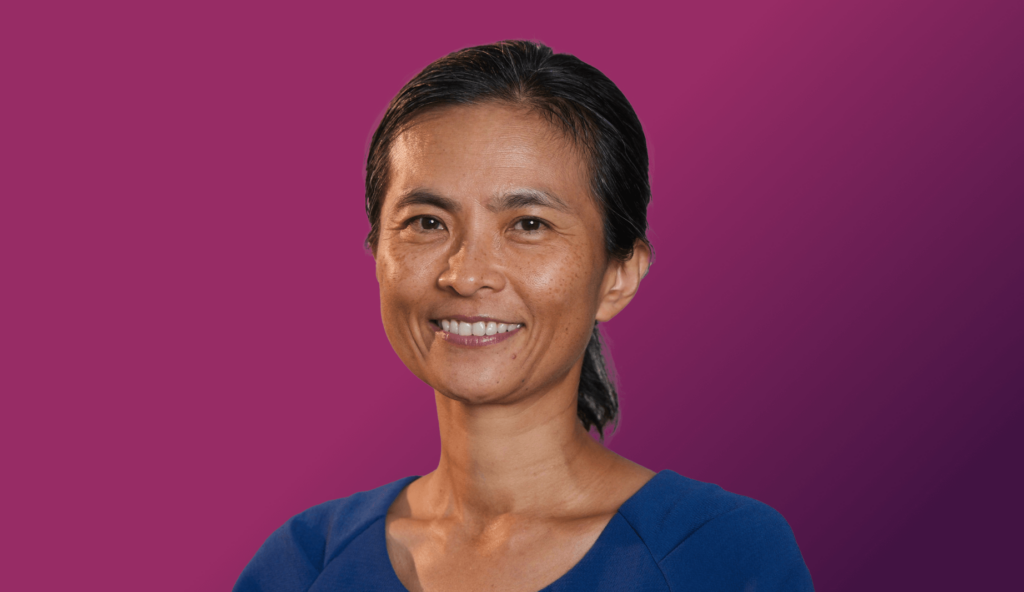 An cutout image of PeiYao Chen over a gradient purple background.